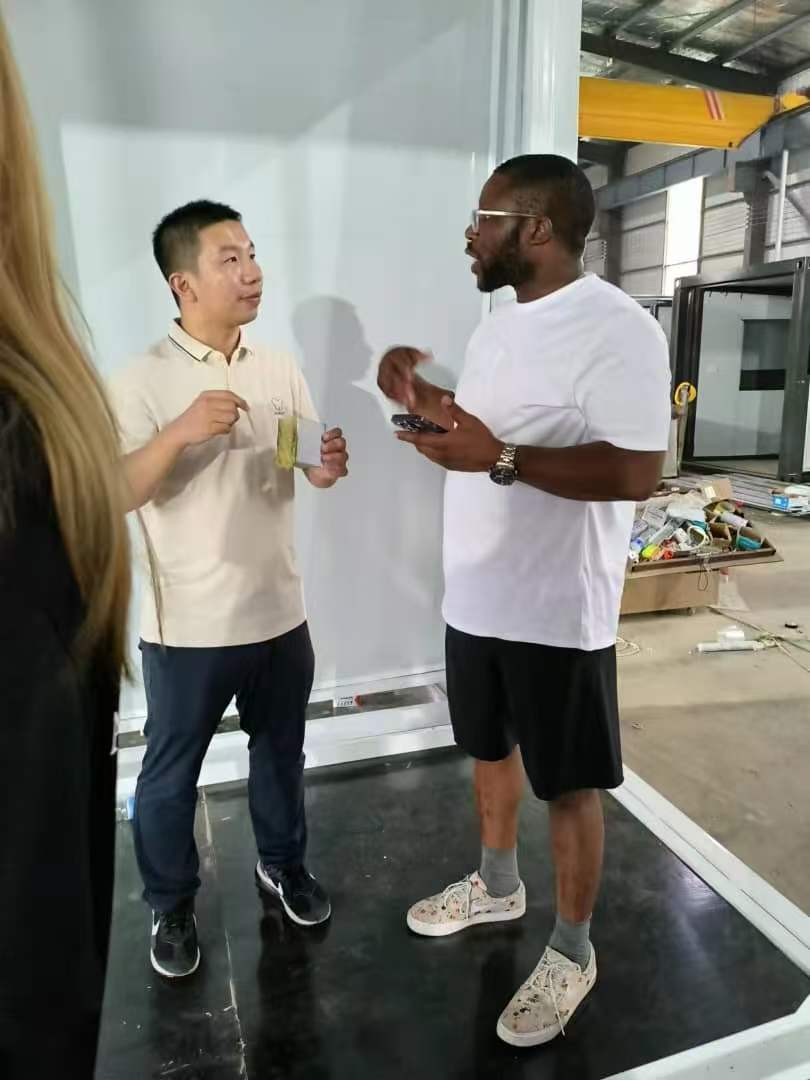 Customers visiting prefab home display site